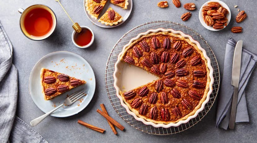 pecan-pie-tart-in-baking-dish-traditional-festive-9WMXQ3Z-1024x572.jpg.webp